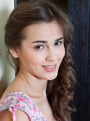 Trista A shows off her naked body under her pretty dress.