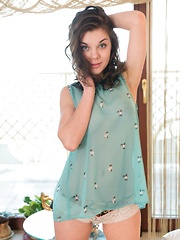 Dakota A gently caresses her fingers down her see-through, blue babydoll before she slips out of it to reveal her delightfully curvy breasts and her h