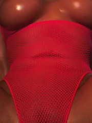 xoGisele rubs hot oil all over her hot body and takes off her tight fishnet bodysuit